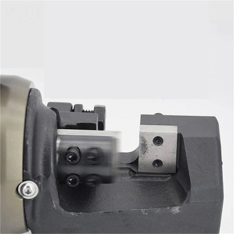 Close-up of AOXHUGB Rc25 Electric Hydraulic Rebar Bender And Cutter Machine blade mechanism, showcasing robust cutting design.