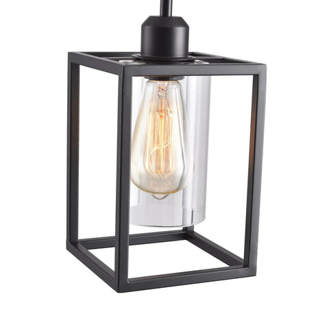 Close-up of Three Pack Black Pendant Lights For Kitchen Island Industrial Lantern Style with clear glass shade and metal frame.