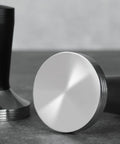 Pro Grade 58 Millimeter Espresso Tamper Plus Five Pin Coffee Distributor Needle Tool Two In One Ground Press Barista Kit on a gray surface.