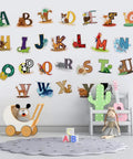 Colorful Alphabet Wall Decals For Kids Peel And Stick ABC Stickers For Kindergarten Playroom Nursery Preschool Tots Precut Educational Wall Art For Baby Rooms displayed on playroom wall.