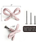 Pink Bow Drawer Pulls And Cabinet Knobs Set, 6 Pack, Solid Metal Handles For Dresser, Vanity, And Kid Friendly Furniture, Adorable Nursery Chic Accent, Easy Swap, Durable And Modern. Pink bow knob, 2-inch wide, with 3 screw lengths.