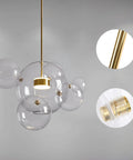 Modern LED Globe Pendant Light With Four Bubble Glass Orbs, Dimmable 3000K-6000K, remote controlled, gold-clear finish close-up