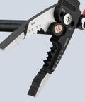 Close-up of Knipex Forged Wire Stripper 13 72 8 8 Inch cutting solid copper wire, showing shear blades and measurements.