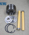 Waterjet piston assembly kit for intensifier pump; includes piston housing, two yellow rods, metal washers, and O-rings.