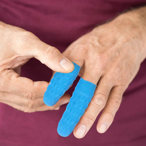 Built Tough 100 Piece Blue Nitrile Anti Static Sleeve Protectors For Tech Repair And Cleanroom Grind reusable finger guards shown on hands.