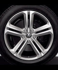 Front view of Volkswagen wheel with Center Cap For Volkswagen Wheels 3B7-601-171-XRW OEM Replacement Hub Cap, showing authentic VW style.