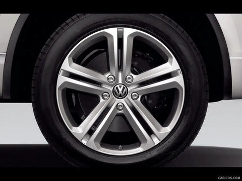 Front view of Volkswagen wheel with Center Cap For Volkswagen Wheels 3B7-601-171-XRW OEM Replacement Hub Cap, showing authentic VW style.