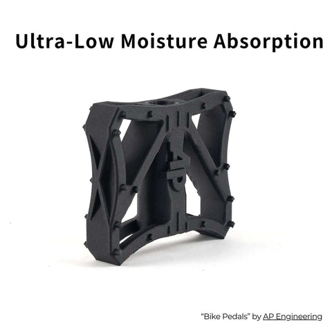 Fibreheart PPA-CF Carbon Fiber Nylon 3D Filament bike pedal prototype showing low moisture absorption feature in black material.