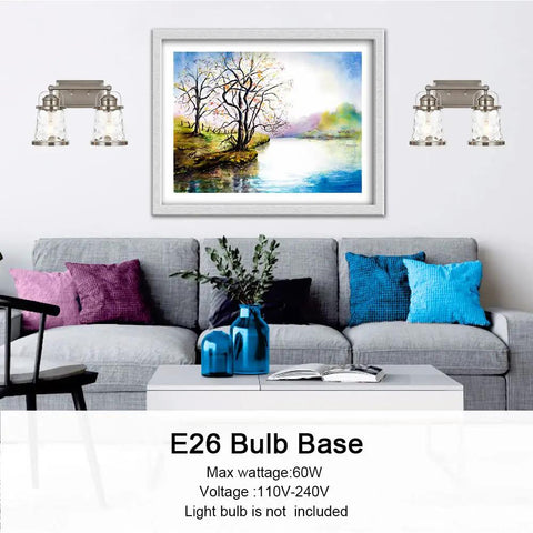 Living room with 2 Light Vanity Light Fixtures in Modern Brushed Nickel Finish over artwork, showcasing industrial style.