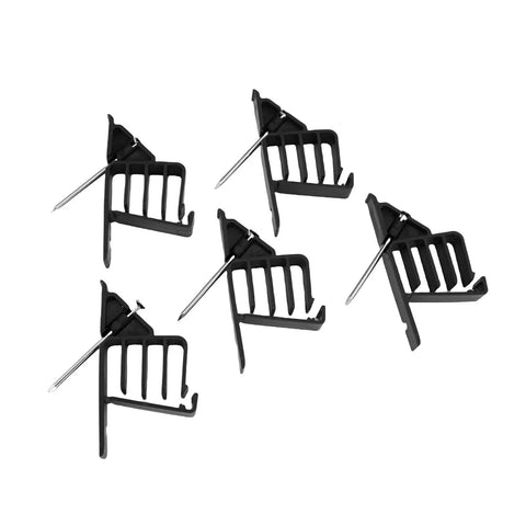 Sturdy 25-Pack Cable Stackers To Keep Cables Organized And Tied Down Neatly For Your Game Setup Or Desk Without Ugly Messes Using These Fasteners That Hold Multiple Wires Securely Together In Spacious Design - Black plastic clips with nails.