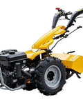 Workhorse Power Rear Tine Tiller Cultivator With 420cc 13.5 HP Gas Engine 8 Inch Tilling Depth Full Gear Drive Transmission Heavy Duty Rototiller For Large Plots And Tough Soil Prep, side view of the tiller showing engine and handles.