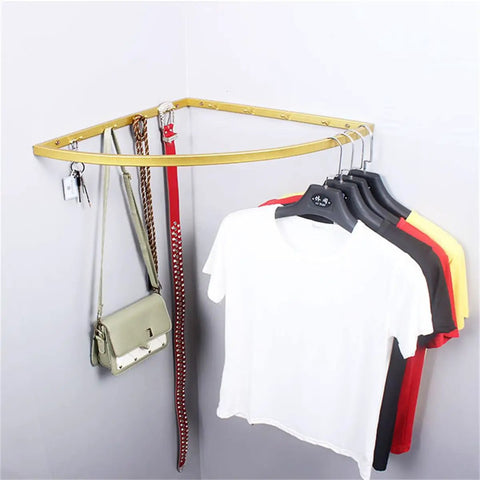 Corner Hanging Bar Wall Mounted Pipe Garment Rack For Small Spaces featuring clothes, bag, and keys, ideal for tight rooms.