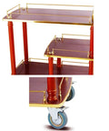 Solid As A Rock Three Tier Serving Cart Heavy Duty Kitchen Utility Trolley With Stainless Steel Accents close-up of wheels and gold trim.