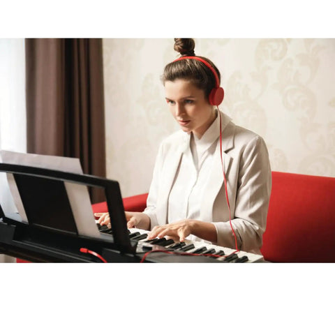 Woman using Universal Music Stand For Sheet Music With Two Clips And Piano Key Stickers Compatible With Yamaha PSR YPT KB DGX Series.