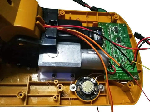 Badass Heavy Duty Full Metal Rotary Slewing Motor Upgrade For 1550 RC Construction Gear showing internal motor and circuit board.