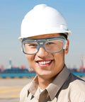 Heavy Duty Welding Safety Goggles With Impact Resistant And Dustproof Lenses For Arc Work worn by a smiling worker in a hard hat