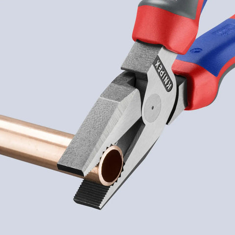 High Leverage 8 Inch Combination Pliers Multi Component Pro Grade Tool cutting copper pipe in workshop