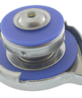Heavy Duty 16 Psi Radiator Cap With Integrated Pressure Relief Valve Direct Swap OE Replacement Cooling System Fix For Honda Hyundai Kia Nissan top view with blue seal.