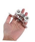2 Pack Sliding Door Rollers Stainless Steel With Silent Nylon Wheels held in hand for size reference