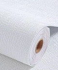 Kick Back The Chill With Prime Thermal Wallpaper For Cold Walls Peel And Stick Heat Blocking Wall Covering roll with textured clean white look.
