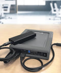 Kickass Dual Bay USB C Enclosure For Two Point Five Inch SATA Drives Featuring Straight Up RAID Setup And Lightning Quick 10Gbps Transfers For Hassle Free Data Storage On The Fly connected to a laptop.
