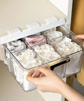 Adhesive Hanging Closet Rod Rack With Extra Sock And Underwear Dividers Straight Up Keeps Your Closets Hella Neat Zero Clutter flexible organizers for socks in clear dividers.