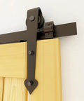 Close-up of a Two Pack Adjustable Barn Door Stopper for 40mm Flat Track Sliding Barn Door Hardware on a wooden door.