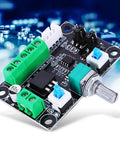 Stepper motor controller board, front view; green terminal blocks, blue jumpers, PCB with mounting holes