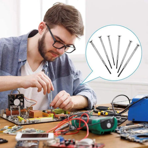 Man using Ultra Handy Mini Screwdriver Set Six Piece Precision Kit For Jewelry Watches Eyeglasses And Electronics Repairs