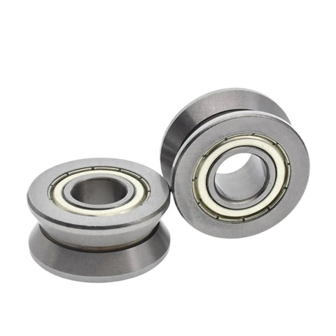 Rock Solid V Groove Guide Roller Bearing With Self Aligning Ball Bearing Design 15Mm X 41Mm X 20Mm Low Friction close-up of two ball bearings