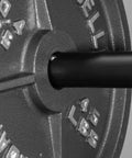 Adapter Sleeve No Frills Converts 1 Inch Standard To 2 Inch Weight Posts fitted on bar with 45lb weight plate