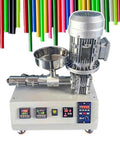 Desktop 3D printer extruder with stainless steel parts and PID controls, recycling plastic into filament, colorful background.