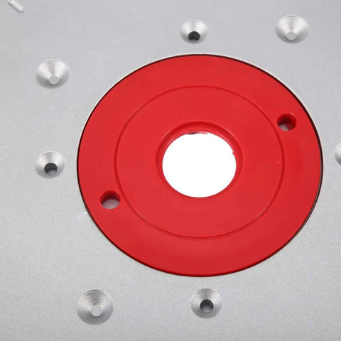 Close-up of Premium Aluminum Alloy Router Table Insert Plate with Center Alignment Bushing for DIY woodworking.