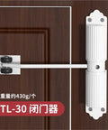Automatic Aluminum Door Closer With Safety Spring Soft Close for Sliding Glass Doors, mounted on wooden door.