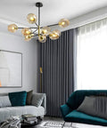 5-Light Sputnik Chandelier With Airblown Glass Globes In Sleek Smoke Grey, pendant light with grey globes in modern living room.