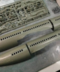 Unassembled plastic parts of One Seventy Two Scale E7A Wedgetail Airborne Radar Aircraft Model Kit in box.
