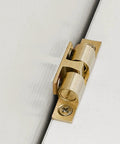 Close-up of 9 Piece Copper Door Ball Catches Set With Nickel Plated Cabinet Tension Latches 35mm on white door