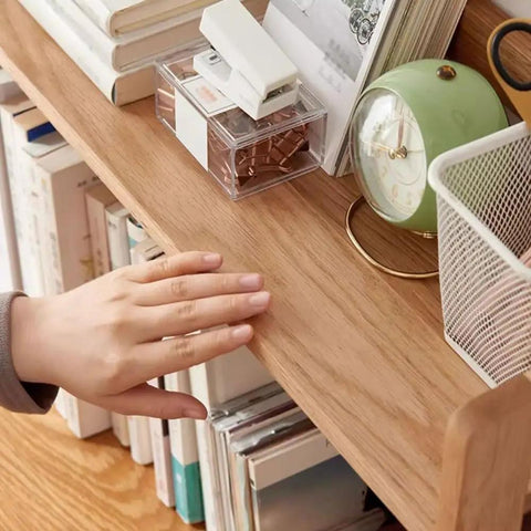 Close-up of Open Style Wooden Bookshelf With Large Capacity Freestanding Storage Organizer showing books and a clock.