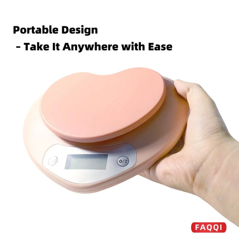 Hand holding portable digital kitchen scale with LCD display, pink finish, 11 lb capacity, ultra accurate 0.03 oz increments, easy tare