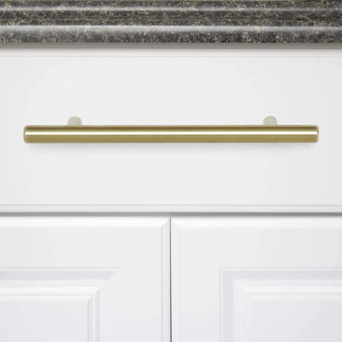Gold Champagne Euro Bar Cabinet Handles 7 And 3 Eighths Inch Long 5 Inch Hole Center One Half Inch Diameter on white cabinet door