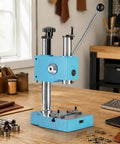 Heavy Duty Manual Arbor Press Built Different Takes A Beating Rock Solid Benchtop Punching And Riveting Tool For Weekend Warriors Compact Shop Fixture That Gets The Job Done, blue manual press on a workbench.