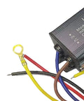 Top Shelf Heavy Duty LED Driver Power Supply For Outdoor Patio And Yard Lighting Runs Slick On Rugged Aluminum Housing With Rock Solid Surge Protection, showing wiring connections and metal casing.