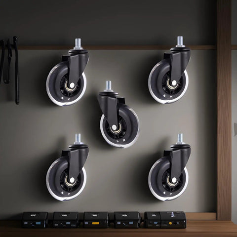 Five Pcs 3 Inch Polyurethane Caster Wheels Silent Rolling Heavy Duty Furniture Casters mounted on wall, showing black wheels and metal stems.