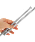 Heavy Duty Coil Pipe Bender Kit For Copper And Steel Tubes, showing two sturdy spring bending tools held by hand.