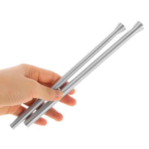 Heavy Duty Coil Pipe Bender Kit For Copper And Steel Tubes, showing two sturdy spring bending tools held by hand.