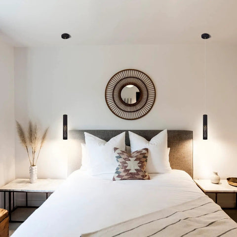 Bedroom setting with Must-Have Modern Sand Black Cylinder Pendant Light For Kitchen Island And Dining Room on either side of bed.