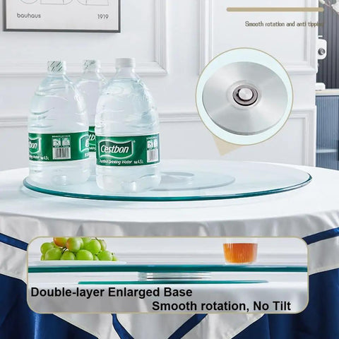 Heavy Duty 43 Inch Lazy Susan Turntable Smooth 360 Rotating Tempered Glass Dining Table Serving Tray with bottles on a table.