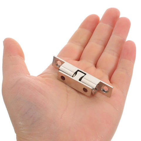 Healeep 10PCS Copper Door Catch With Silent Close Function For Kitchen Cabinets, sturdy snap latch shown in a hand.