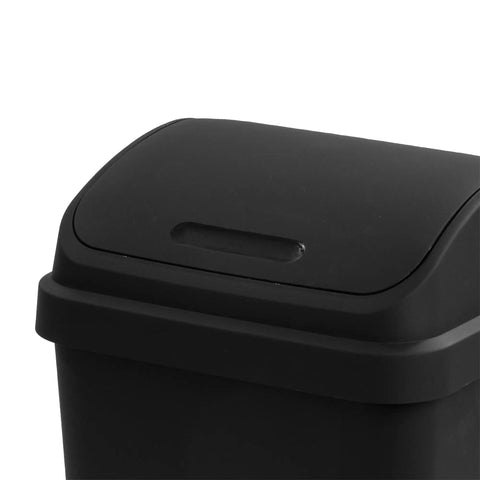 Close-up of a 13 Gallon Swing Top Trash Can Black Durable Plastic Wastebasket With Easy Swing Lid For Home Or Office Sturdy Waste Receptacle.