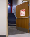 Keep It Clear Fire Exit Sign 10x7 Aluminum Do Not Block Door Weather Resistant Rust Free Easy Mounting 2 Pack High Visibility Red On White For Quick Safety Reminder on a fire exit door